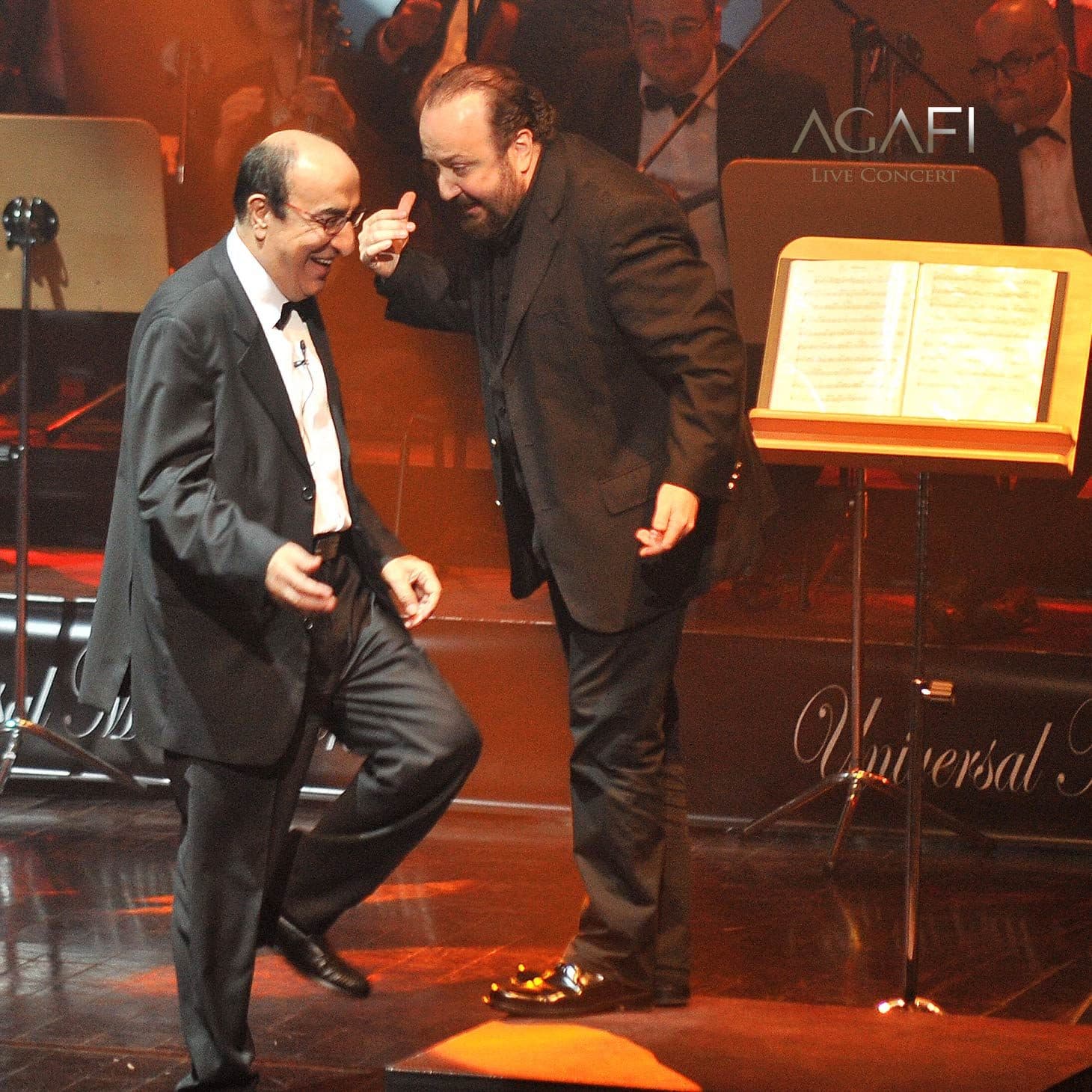Elias Rahbani on stage with a guest
