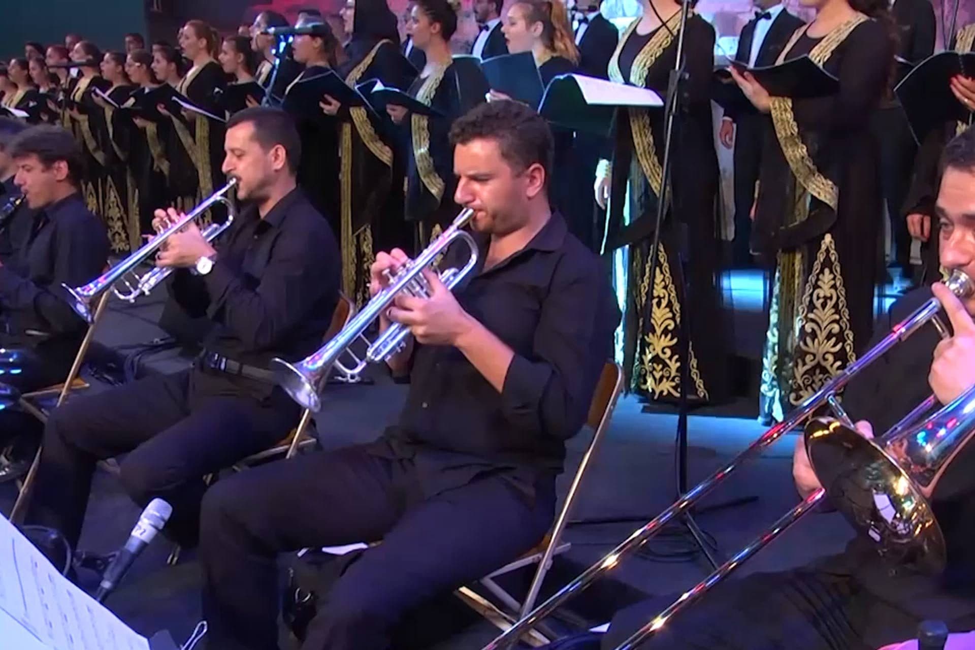 The brass section in front of the choir