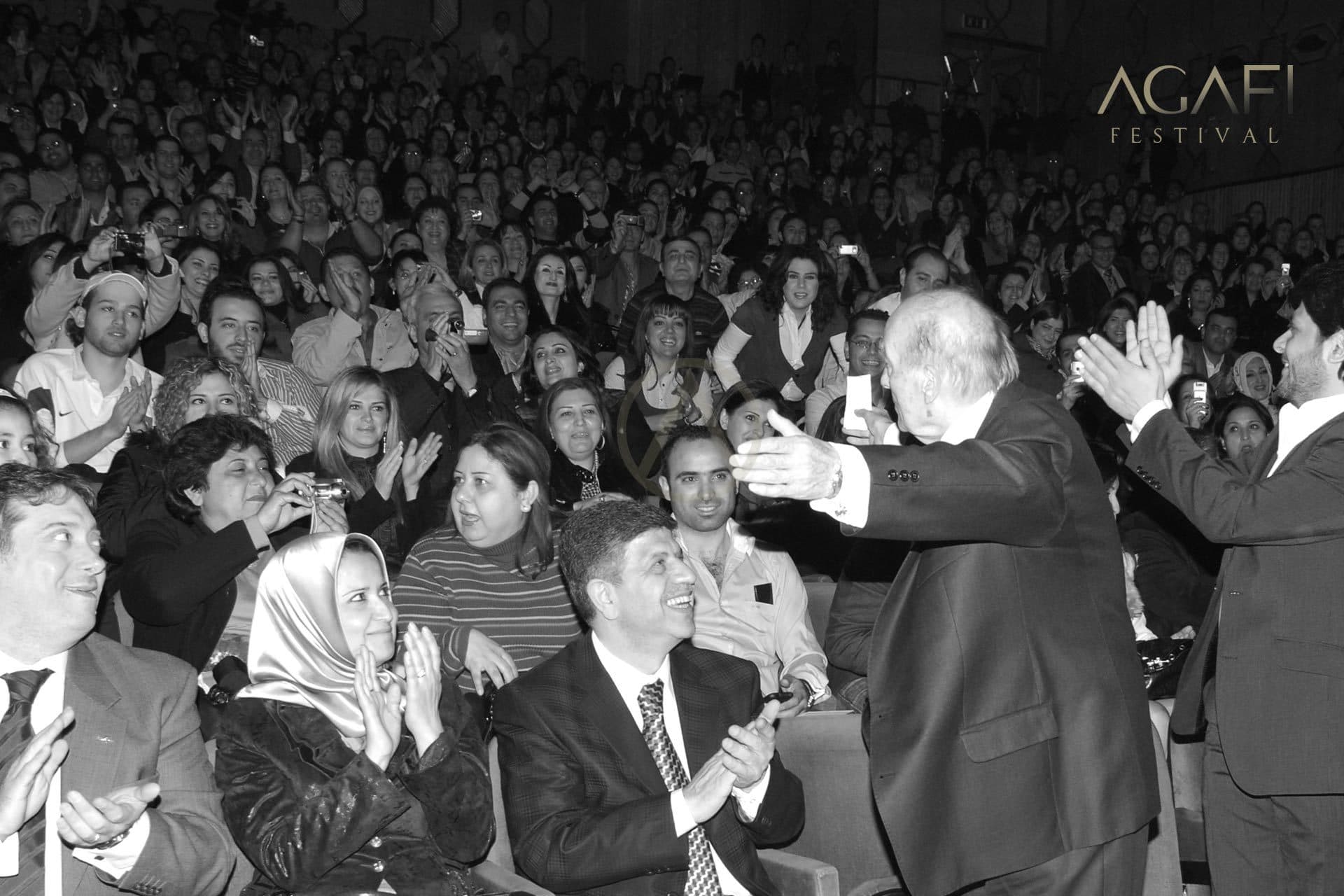Wadee Al Safi embracing a singer in the audience