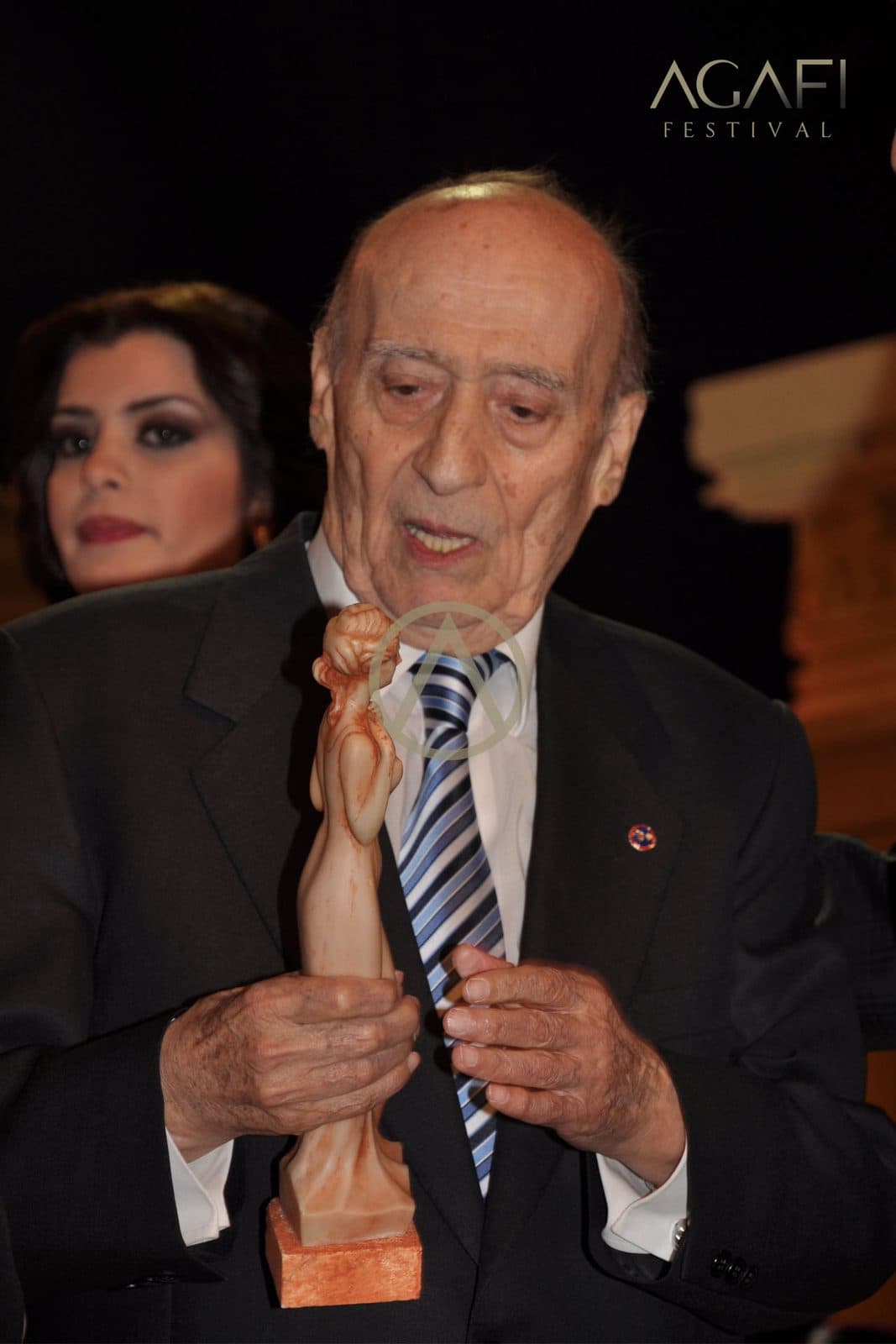 Wadee Al Safi on stage with the singers who performed his songs