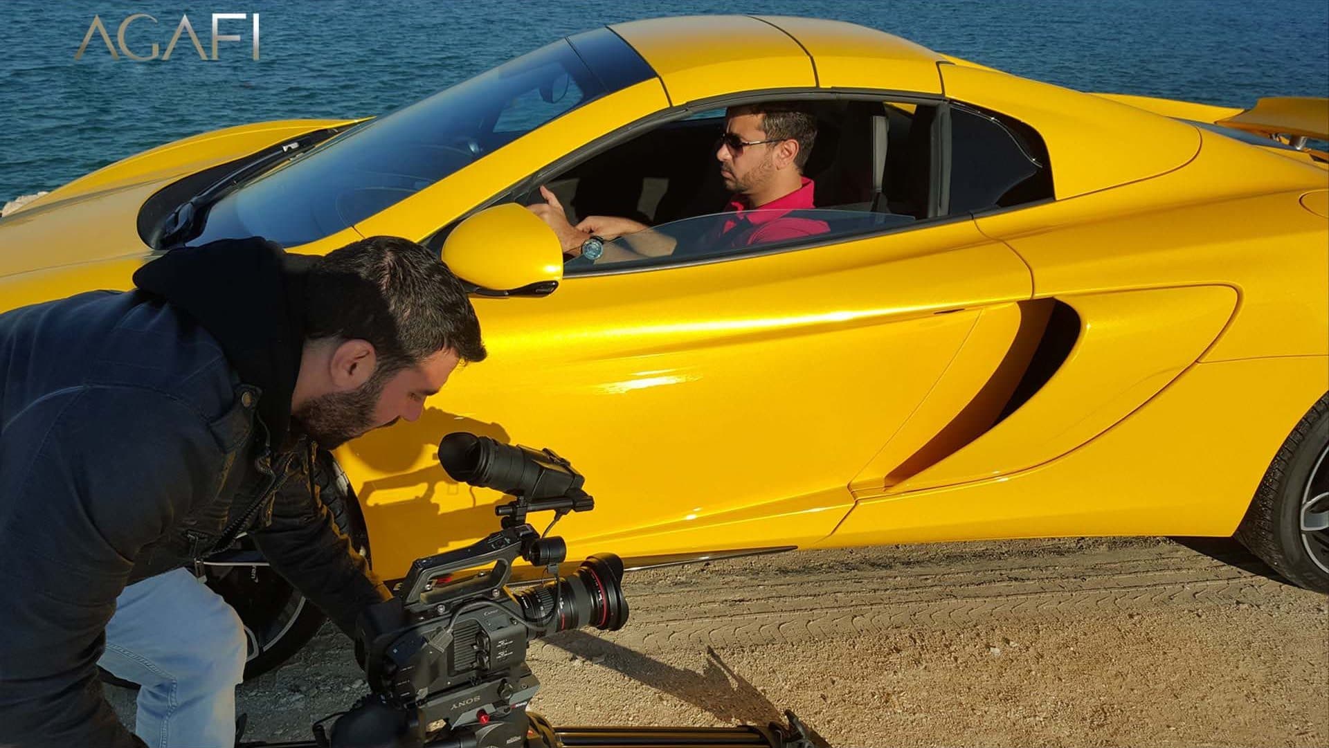 Filming a driver in a yellow McLaren