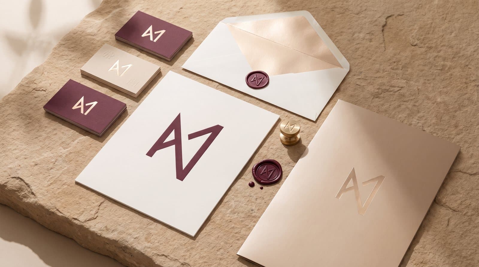 Brand stationery set with foil-stamped cards and wax seal